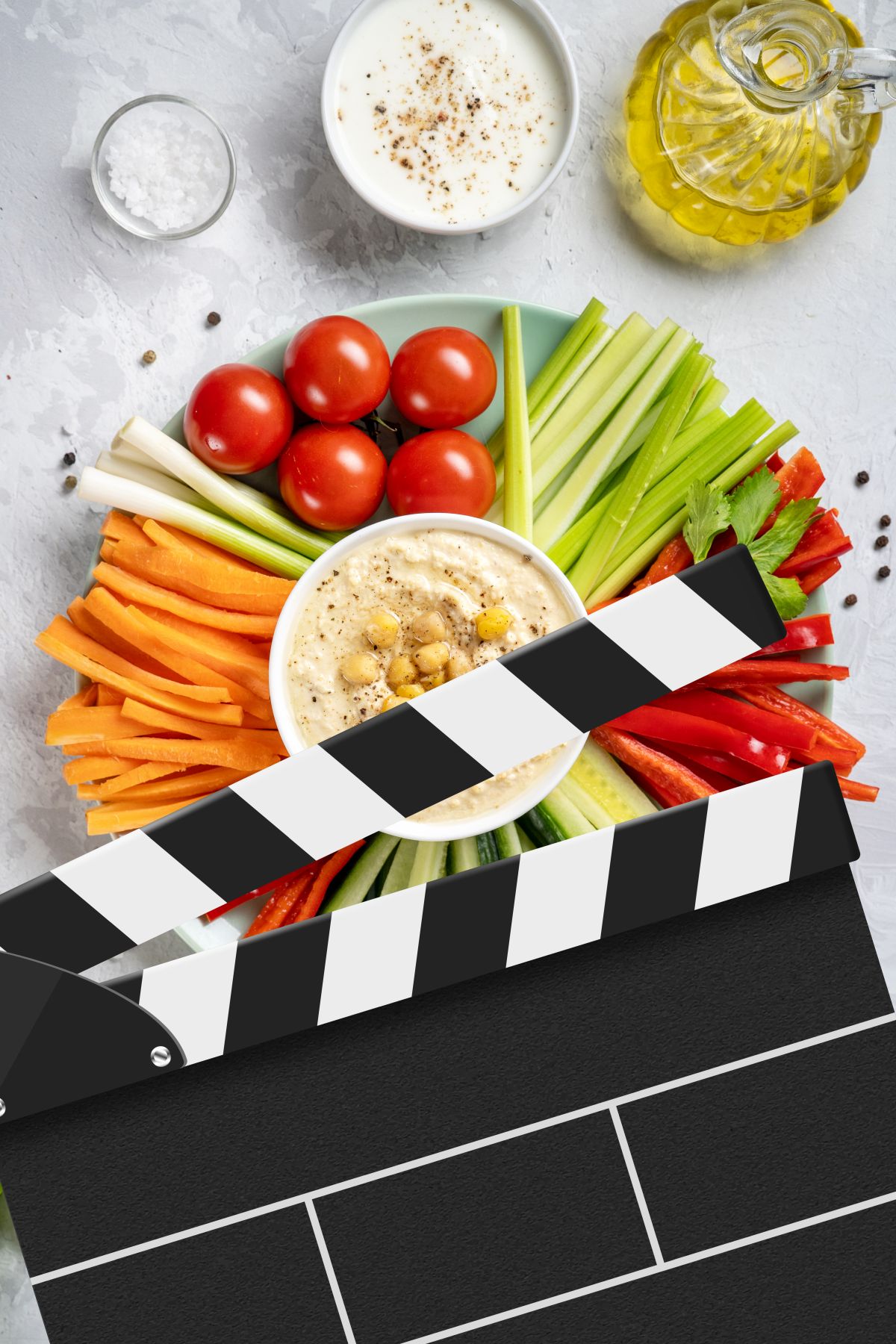 Plate with assorted fresh vegetable sticks with dips